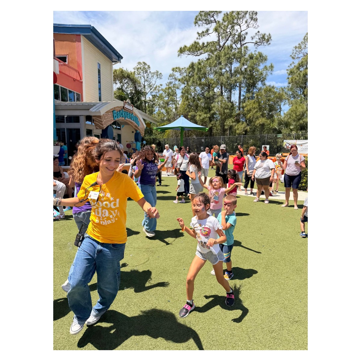 Children running and playing outdoors at Golisano Children’s Museum of Naples