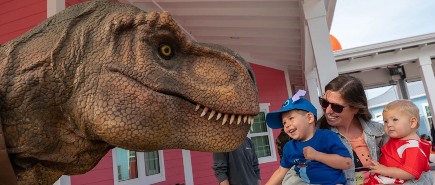 A family meets a costumed character at Boo at the Zoo. Photo: Naples Zoo at Caribbean Gardens
