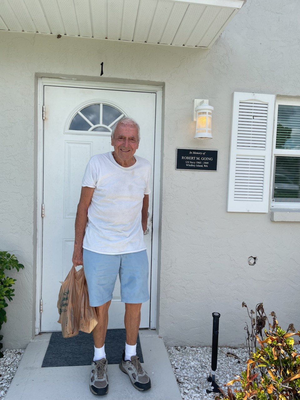 Richard standing in the doorway of his new home at Delta House